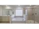 Bathroom with a soaking tub, separate shower, and double vanity at 566 Richfield Way, Summerville, SC 29486