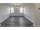 Simple dining room with hardwood floors and wainscoting at 566 Richfield Way, Summerville, SC 29486