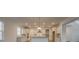 Kitchen with white cabinets, granite countertops, and an island at 566 Richfield Way, Summerville, SC 29486