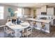Kitchen with a large island, white cabinets, and a breakfast nook at 566 Richfield Way, Summerville, SC 29486