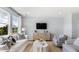 Living room with white couch, armchairs, and a herringbone console at 568 Richfield Way, Summerville, SC 29486