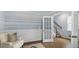Home office with built-in shelving and French doors at 568 Richfield Way, Summerville, SC 29486