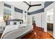 Main bedroom with hardwood floors and en-suite bathroom access at 66 Warren St # Entire Property, Charleston, SC 29403