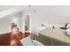 Spacious bedroom with hardwood floors and an ensuite bathroom at 66 Warren St # Entire Property, Charleston, SC 29403