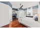 Spacious bedroom with hardwood floors, a fireplace, and a view of the backyard at 66 Warren St # Entire Property, Charleston, SC 29403