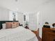 Main bedroom with plush bedding and a walk-in closet at 66 Warren St # Entire Property, Charleston, SC 29403