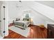 Charming bedroom with hardwood floors and a ceiling fan at 66 Warren St # Entire Property, Charleston, SC 29403