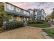 Charming two-story home with a covered porch and landscaped yard at 66 Warren St # Entire Property, Charleston, SC 29403