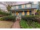 Charming two-story home with a covered porch and landscaped yard at 66 Warren St # Entire Property, Charleston, SC 29403