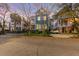 Charming two-story home with a teal exterior at 66 Warren St # Entire Property, Charleston, SC 29403