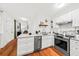 Modern kitchen features stainless steel appliances and white shaker cabinets at 66 Warren St # Entire Property, Charleston, SC 29403