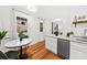 Bright kitchen with white cabinets, marble countertops, and a breakfast nook at 66 Warren St # Entire Property, Charleston, SC 29403