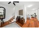 Spacious living area with hardwood floors and staircase at 66 Warren St # Entire Property, Charleston, SC 29403