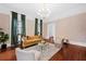 Bright living room with hardwood floors and stylish seating at 66 Warren St # Entire Property, Charleston, SC 29403