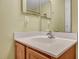 Clean bathroom with single sink vanity and shower/tub combination at 7963 Shadow Oak Dr, North Charleston, SC 29406