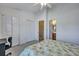 Bright bedroom with double bed, ceiling fan and en-suite bathroom at 7963 Shadow Oak Dr, North Charleston, SC 29406