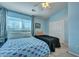 Spacious bedroom with two beds, ceiling fan, and good closet space at 7963 Shadow Oak Dr, North Charleston, SC 29406