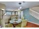 Bright dining area with glass table and four chairs at 7963 Shadow Oak Dr, North Charleston, SC 29406