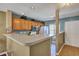 Kitchen with a breakfast bar and wood cabinets at 7963 Shadow Oak Dr, North Charleston, SC 29406