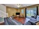 Living room with hardwood floors and sliding glass doors at 7963 Shadow Oak Dr, North Charleston, SC 29406