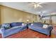 Spacious living room with hardwood floors and two sofas at 7963 Shadow Oak Dr, North Charleston, SC 29406
