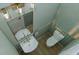 Powder room with pedestal sink and vertical shiplap at 105 Mayfair Ct, Summerville, SC 29485