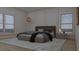Spacious bedroom with plush bedding and large windows at 105 Mayfair Ct, Summerville, SC 29485