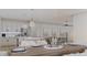 Bright dining room features a rustic wood table and seating for six at 105 Mayfair Ct, Summerville, SC 29485