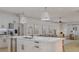Open concept kitchen with island, stainless steel appliances, and white cabinetry at 105 Mayfair Ct, Summerville, SC 29485