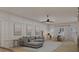 Bright and airy living room with sectional sofa and large windows at 105 Mayfair Ct, Summerville, SC 29485