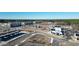Aerial view of a residential area with shops and roads at 111 Crimson St, Summerville, SC 29486