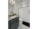 Clean bathroom with dark vanity, shower, and tile floors at 111 Crimson St, Summerville, SC 29486
