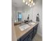 Bathroom with double vanity and modern light fixtures at 111 Crimson St, Summerville, SC 29486