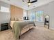 Spacious primary bedroom with large windows and wood accent wall at 111 Crimson St, Summerville, SC 29486