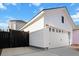 White detached garage with double doors and window at 111 Crimson St, Summerville, SC 29486