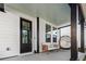 Inviting front porch with stylish seating and light green ceiling at 111 Crimson St, Summerville, SC 29486