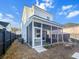 White two-story house with screened porch and yard at 111 Crimson St, Summerville, SC 29486
