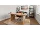Light-filled home office featuring a wood desk and stylish decor at 111 Crimson St, Summerville, SC 29486