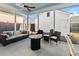 Relaxing screened porch with seating and fire pit at 111 Crimson St, Summerville, SC 29486
