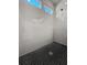 Modern shower with gray tile and hexagon floor at 111 Crimson St, Summerville, SC 29486