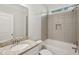 Bathroom boasts granite countertop, tub and shower combo at 1216 Ashley Hall Rd, Charleston, SC 29407