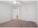 Spacious bedroom with neutral decor and carpet at 1216 Ashley Hall Rd, Charleston, SC 29407