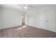 Bright bedroom with double doors and carpet at 1216 Ashley Hall Rd, Charleston, SC 29407