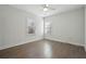 Bright bedroom featuring hardwood floors and a ceiling fan at 1216 Ashley Hall Rd, Charleston, SC 29407