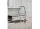 Modern kitchen sink and faucet with granite countertop at 1216 Ashley Hall Rd, Charleston, SC 29407