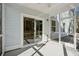 Screened porch with sliding glass door access to backyard at 1216 Ashley Hall Rd, Charleston, SC 29407