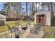 Large backyard with treehouse, playset and patio seating at 125 Trickle Dr, Summerville, SC 29483