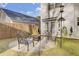 Cozy backyard patio with fire pit and seating area at 125 Trickle Dr, Summerville, SC 29483