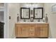 Bathroom with double vanity and light wood cabinets at 125 Trickle Dr, Summerville, SC 29483