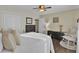 Bright bedroom with king-size bed, hardwood floors and a built-in dresser at 125 Trickle Dr, Summerville, SC 29483